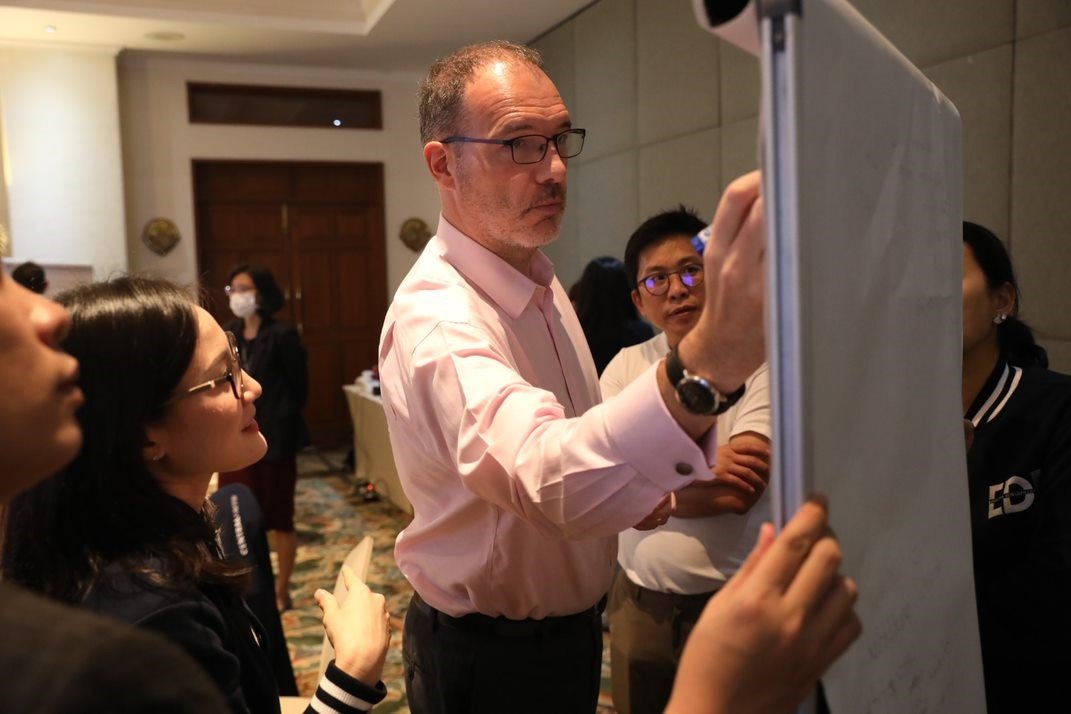 Decode Central Group's "People" development strategy to "Cope" with the changing world